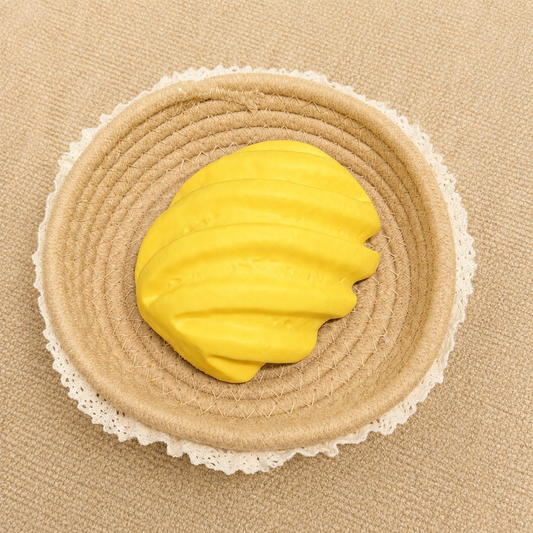 Realistic pineapple slow rising squishy with detailed fruit texture and soft foam feel