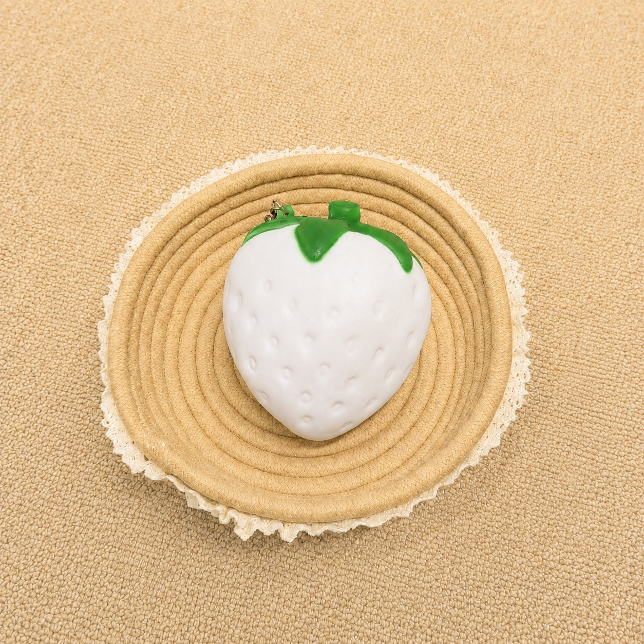Strawberry keychain slow rising squishy with cute fruit design.