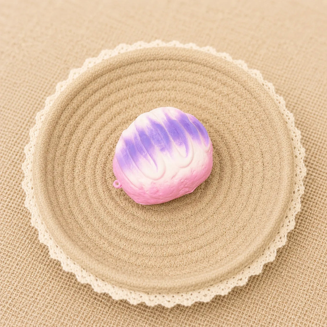 Mini cake slow rising squishy with cute dessert design and soft foam texture.